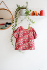 Organic cotton puffed sleeve kids top.