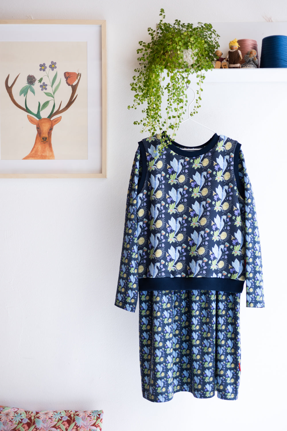 Kids organic cotton sweater vest and long sleeve dress.