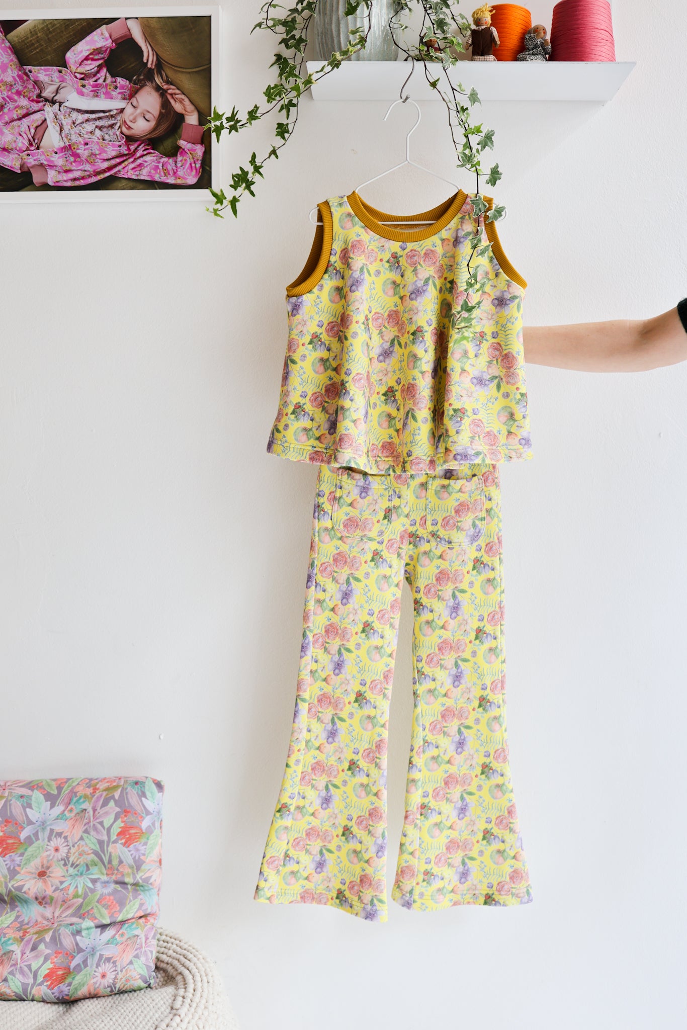Kids organic cotton flared sweater vest.