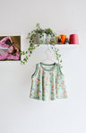 Kids organic cotton flared sweater vest.