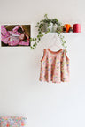 Kids organic cotton flared sweater vest.