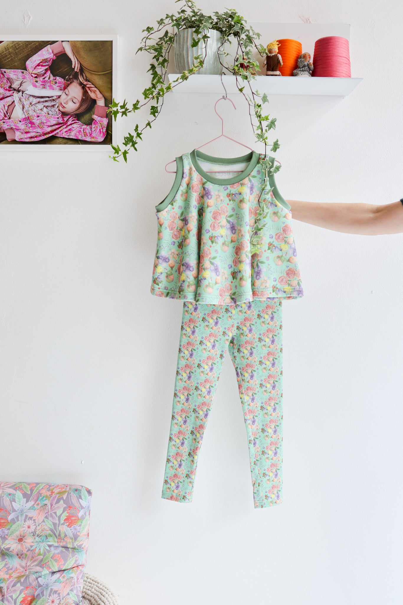 Kids organic cotton flared sweater vest and leggins.