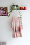 Kids long sleeve extra flared slip dress.