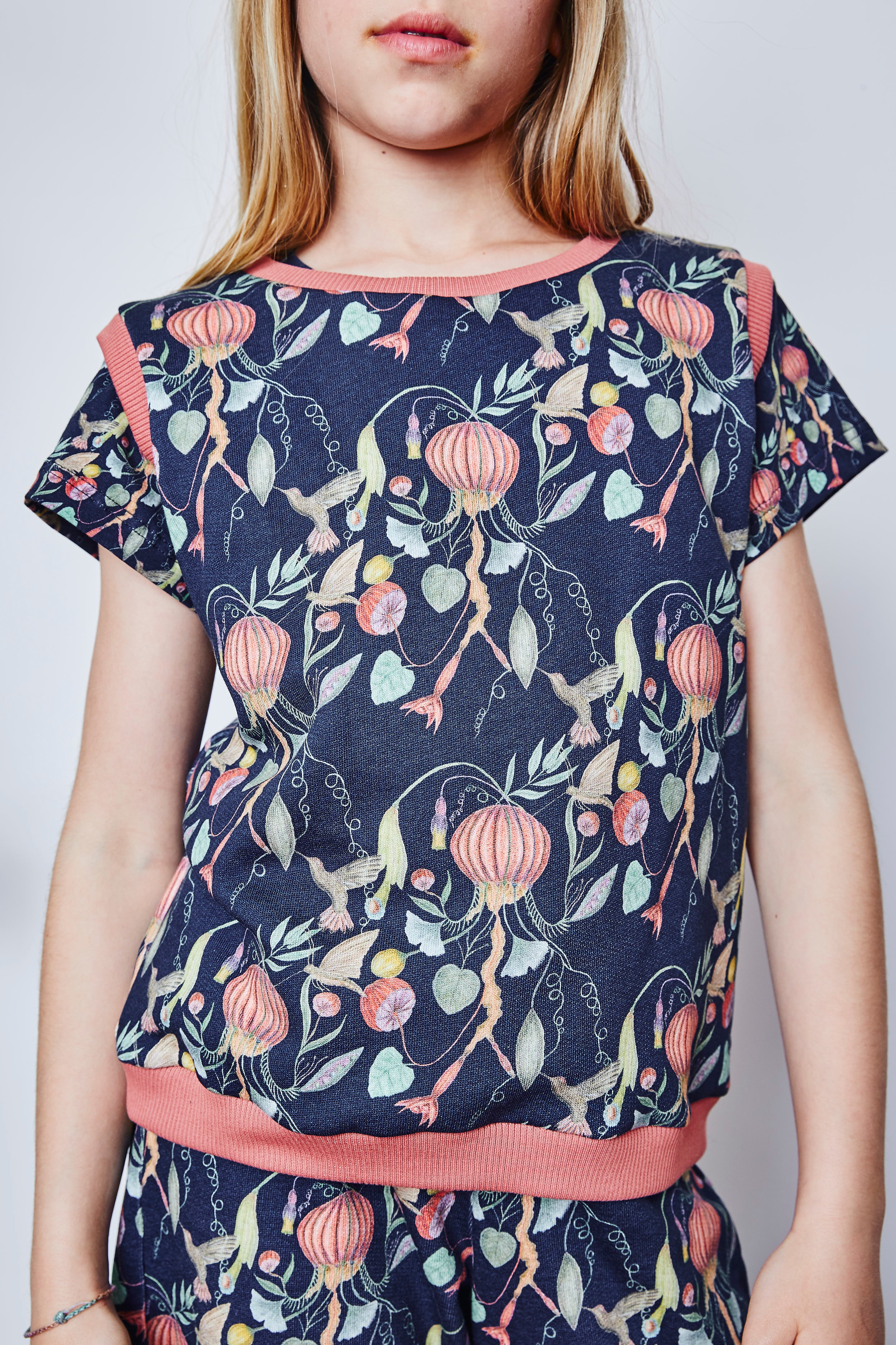 Kids organic cotton sweater vest.